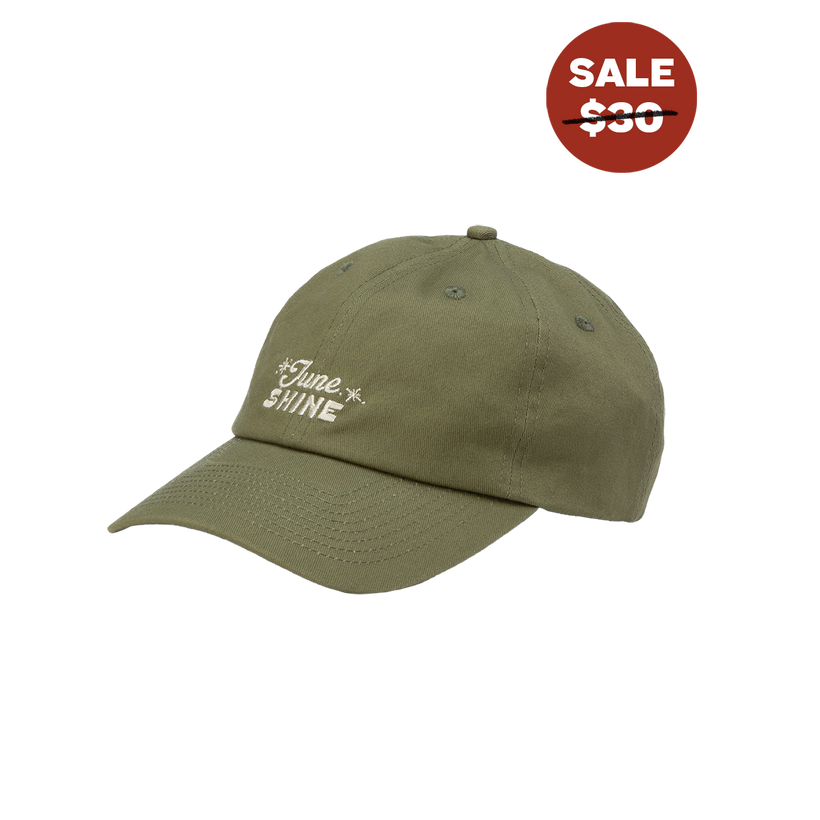 Side View of Green dad hat with embroidered stars and text that reads