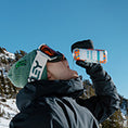 Sage Kotsenburg pouring juneShine into his mouth