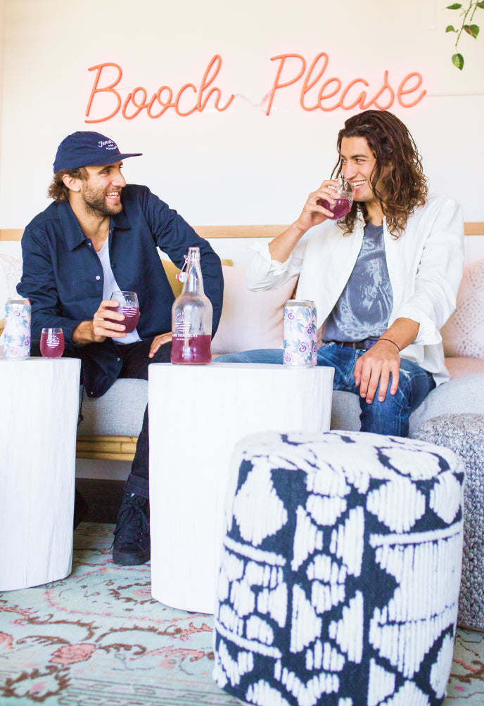 JuneShine cofounders enjoying some hard kombucha at the tasting room