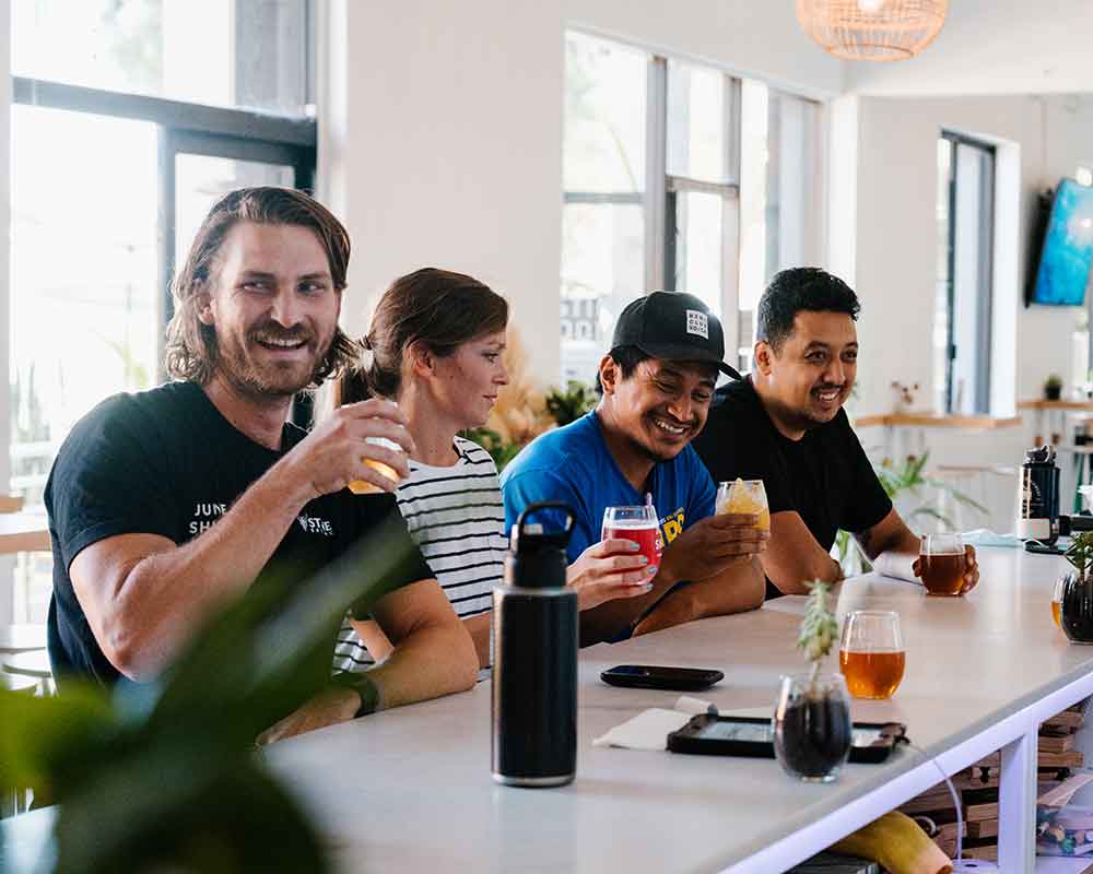 friends drinking at a bar