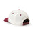 back view of white cap with red brim. Snap back adjustable for size with small tag that reads: June Shine