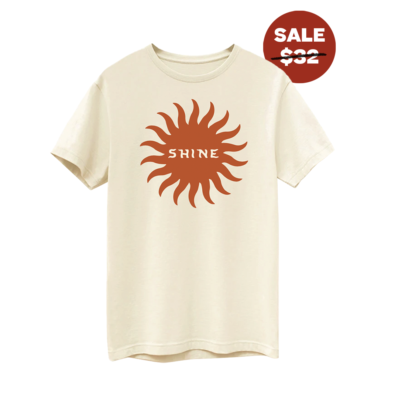 Front view of short sleeve cream colored shirt with a dark orange shape of a sun with the word "shine" on the inside of the shape.