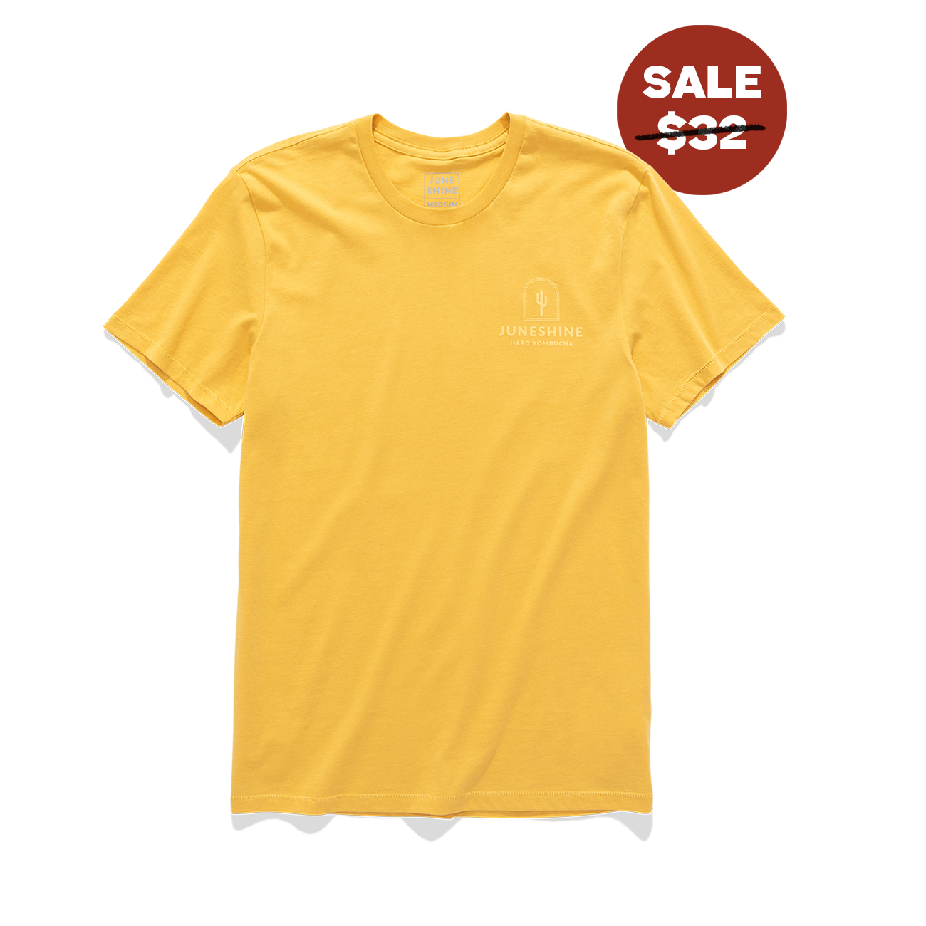 Front view of yellow tee shirt with graphic on the top left of a catus and test that reads "June shine hard kombucha"